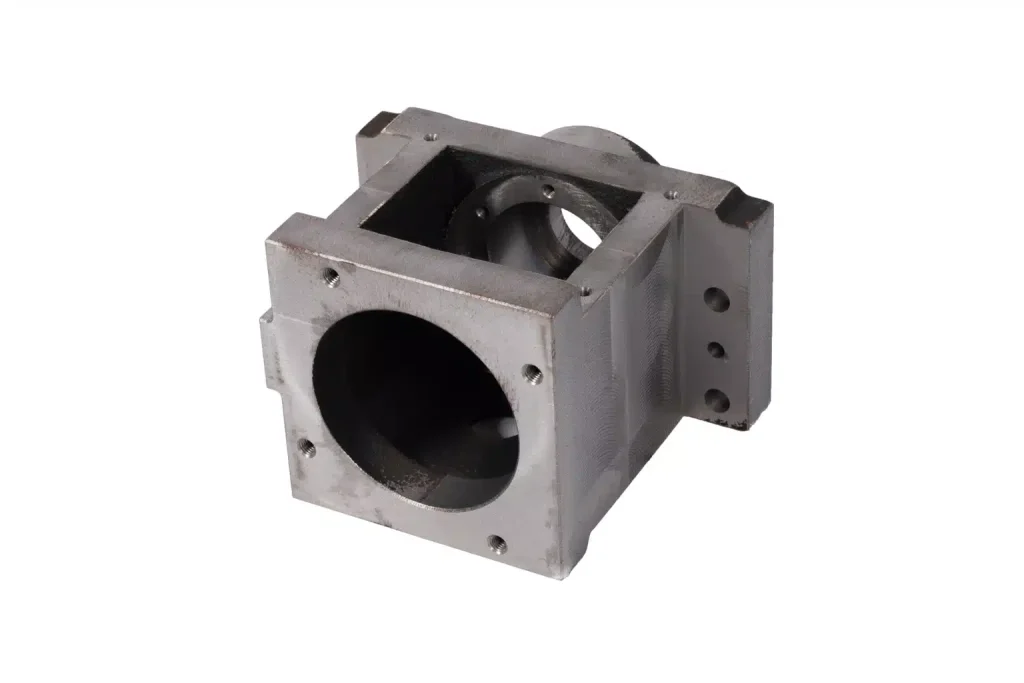 5-axis machined application block with large bore and multi-face features