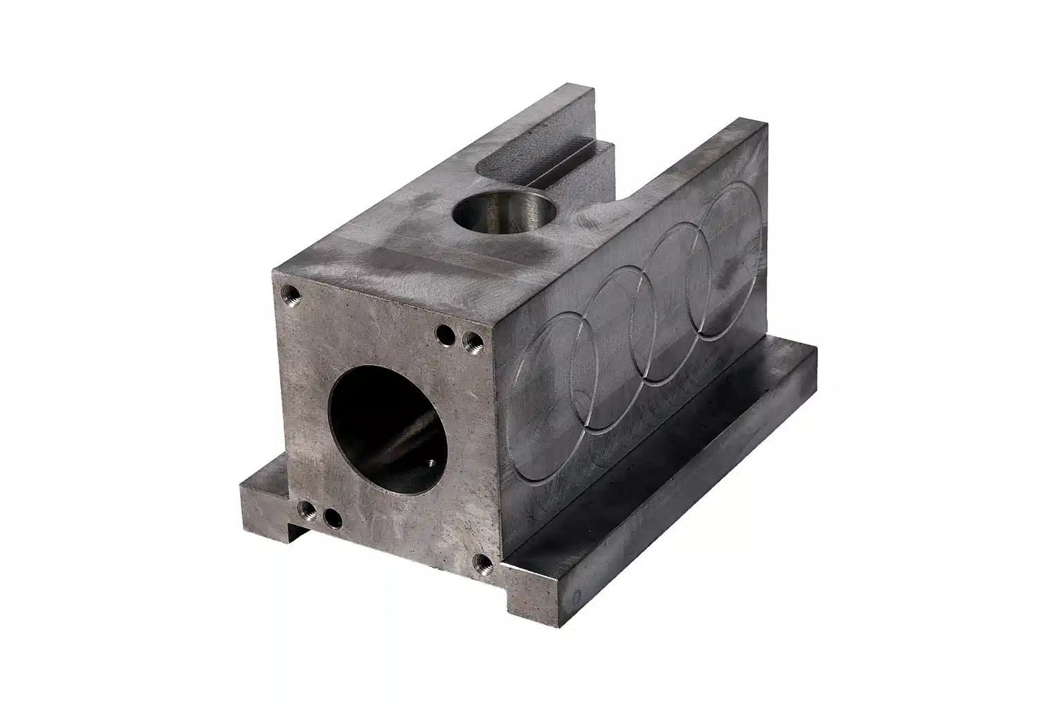 Custom CNC milled steel block component with drilled holes and machined surfaces