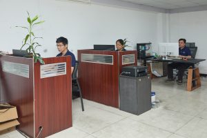 Team discussion in the Minhe office meeting area