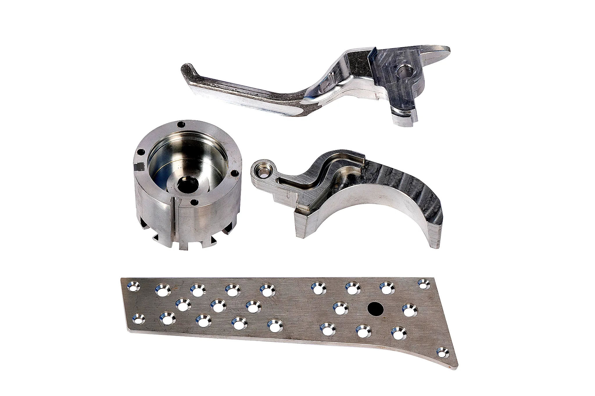 Custom CNC machined aluminum parts including a lever, housing, bracket, and drilled plate