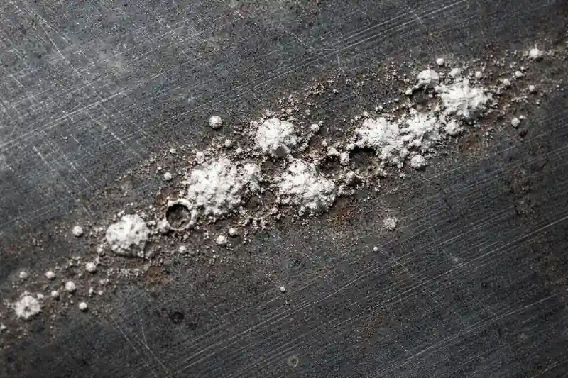 Aluminum surface corrosion with white oxide deposits and localized pitting