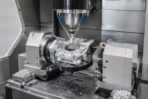 4-axis CNC machining of an aluminum part on a rotary fixture inside a vertical machining center